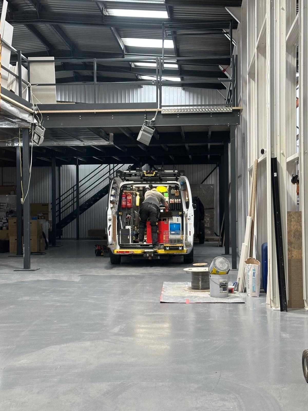 Our engineer working from the van on a warehouse fit-out